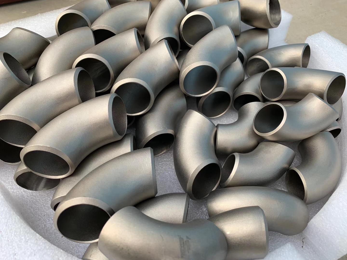 钛弯头的生产工艺